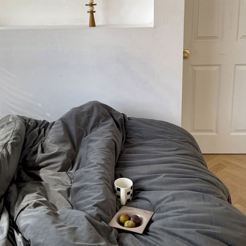 Solid Ash Grey velvet bedding set with soft plush texture and minimalist cozy bedroom scene - RoomDen