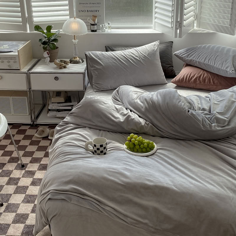 Solid Ivory Grey velvet bedding set with soft plush texture and minimalist cozy bedroom scene - RoomDen