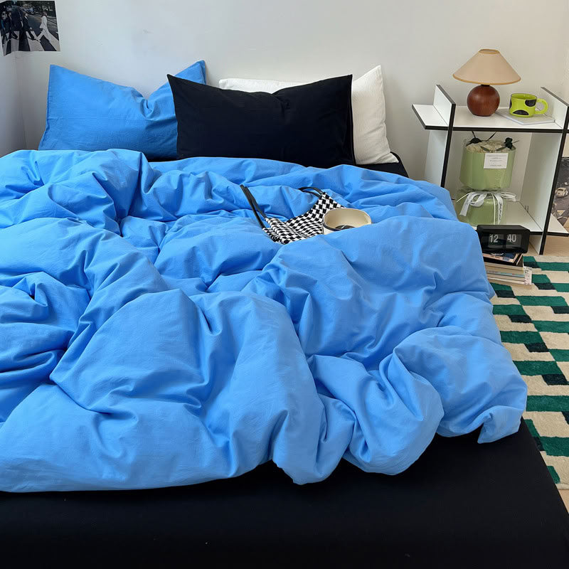 Blue and black two-tone solid cotton bedding set with soft washed texture – RoomDen