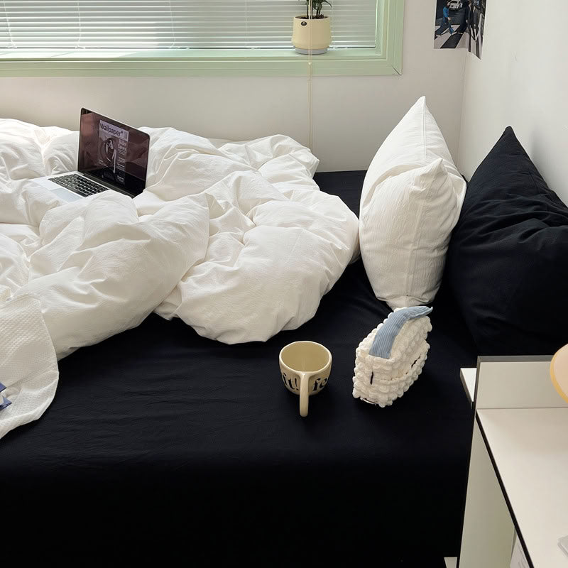 Washed cotton black and white bedding set creating clean, cozy minimalist bedroom look – RoomDen