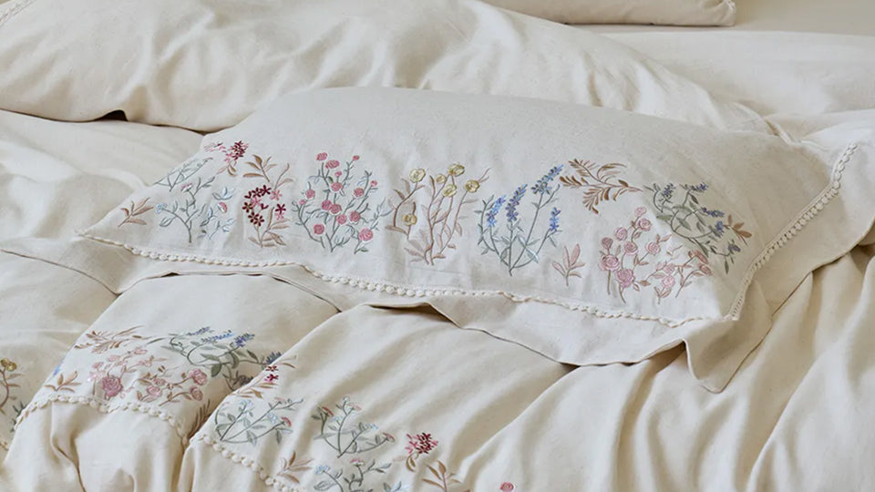 Coordinated bedding set lifestyle shot, showing the complete duvet cover, sheet, and pillowcase components.