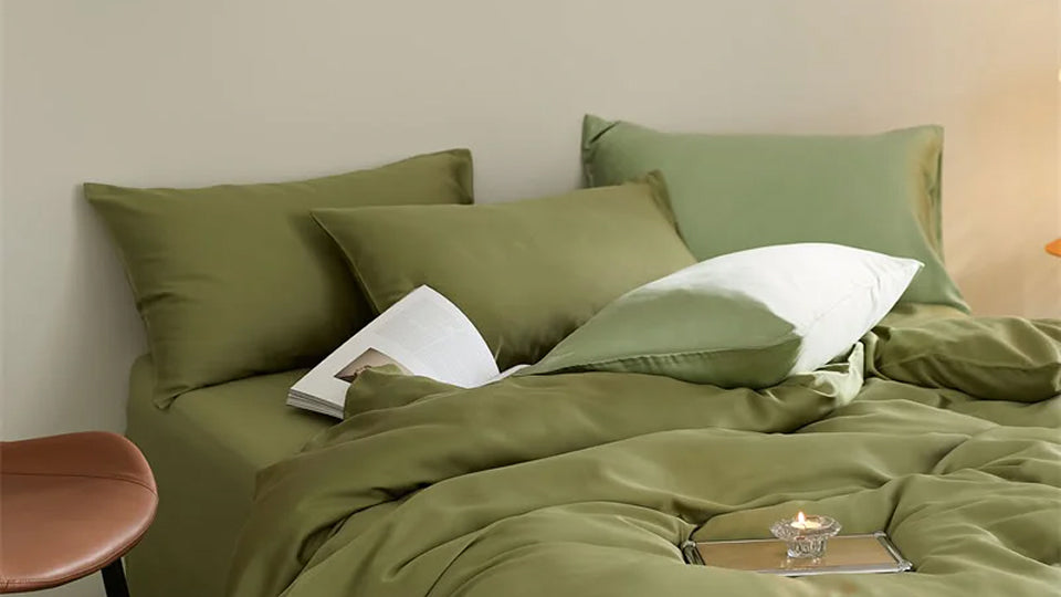 Close-up of silky, cooling Tencel bedding, emphasizing its sweat-wicking and skin-friendly properties.