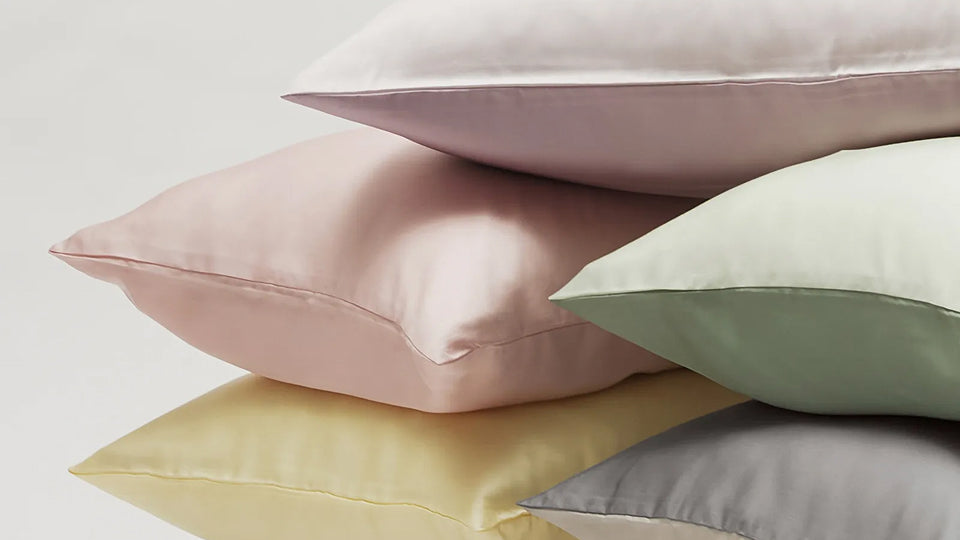 Close-up of a silky pillowcase, highlighting skin and hair protection by reducing friction.