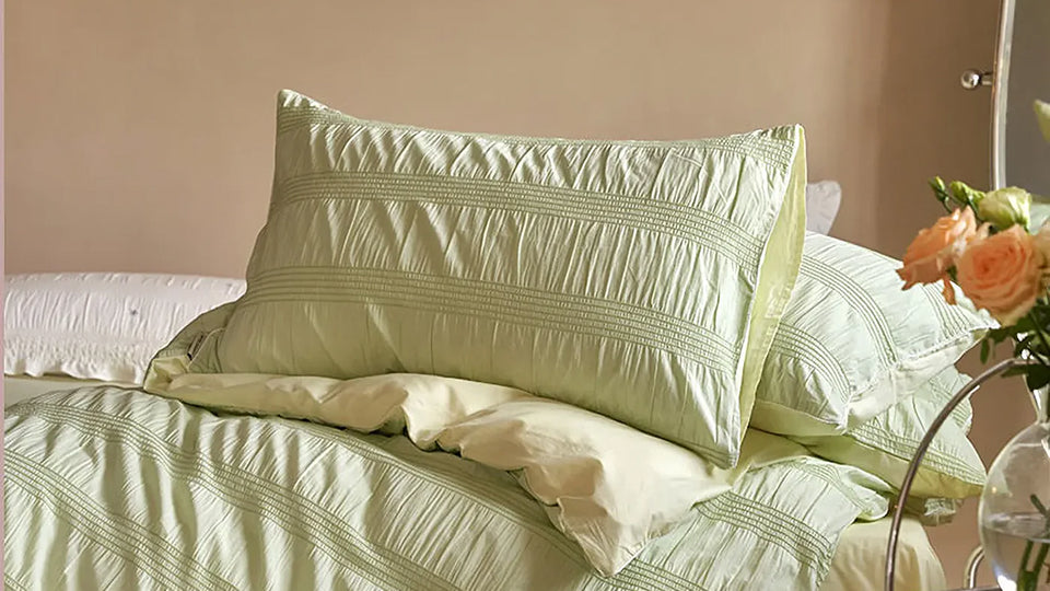 Bedding with a 3D textured feel, emphasizing layering and tactile depth.