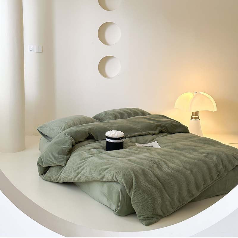 Wave textured plush bedding – matcha green full bed on a curved white platform - Roomden