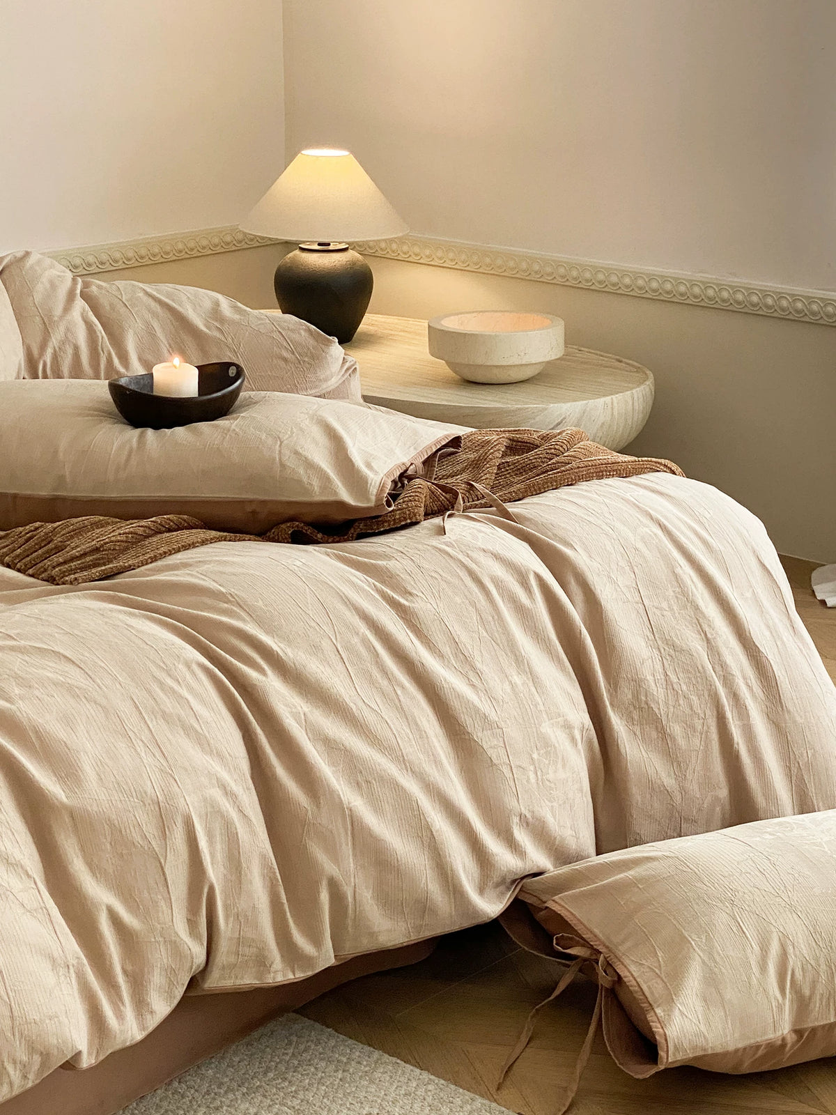 Odile Brushed Cotton Bedding Set – soft beige duvet folds beside the bed - Roomden