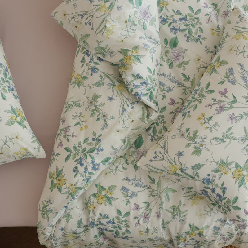 Verbena Botanical Cotton Bedding Set – overhead detail of wildflower pillows and cotton fabric - Roomden