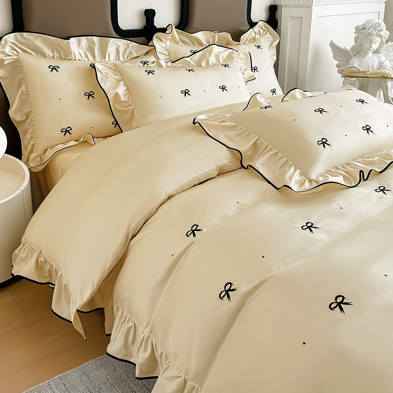Bow embroidered ruffle cotton bedding set – Champagne, coordinated duvet and pillows - Roomden
