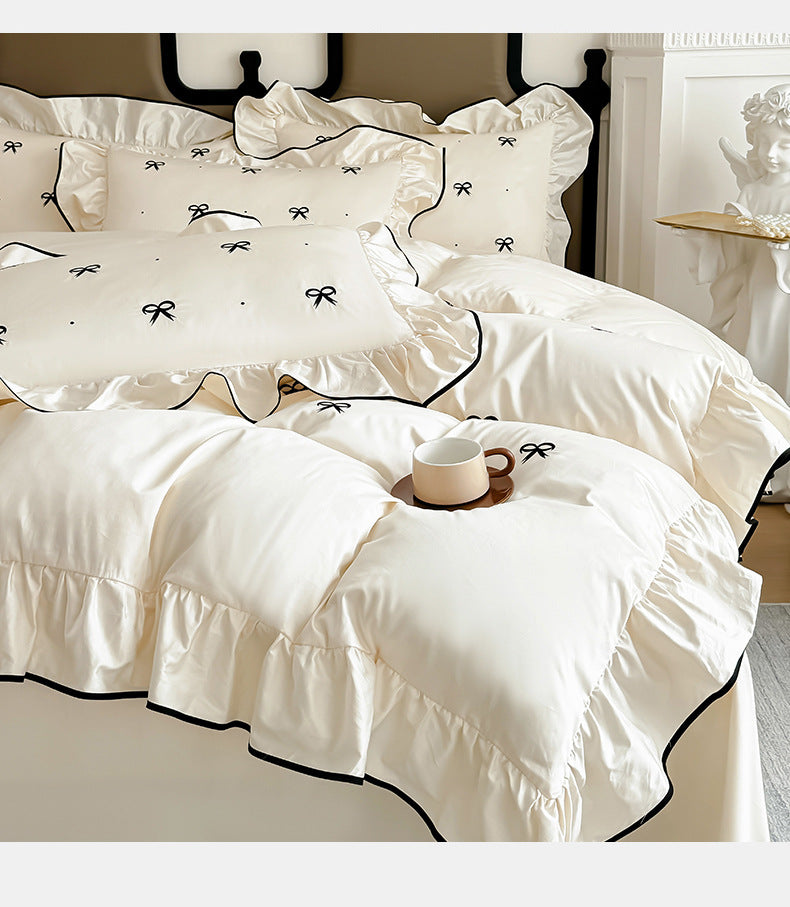Bow embroidered ruffle cotton bedding set – Cream White, folded duvet and ruffled edge - Roomden