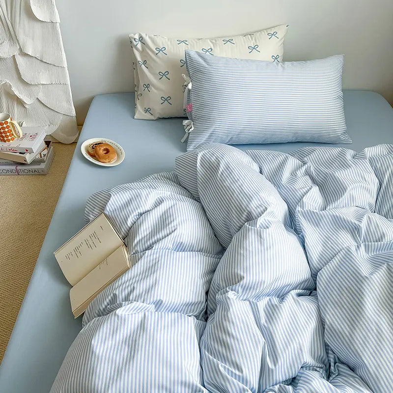 Bow striped cotton bedding set – Powder Blue, coordinated duvet and pillow view - Roomden