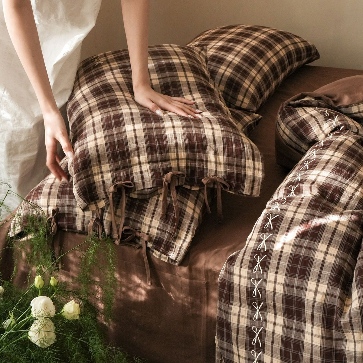 Brackenwood Checked Cotton Bedding Set – mocha checked pillows and folds of the matching duvet - Roomden