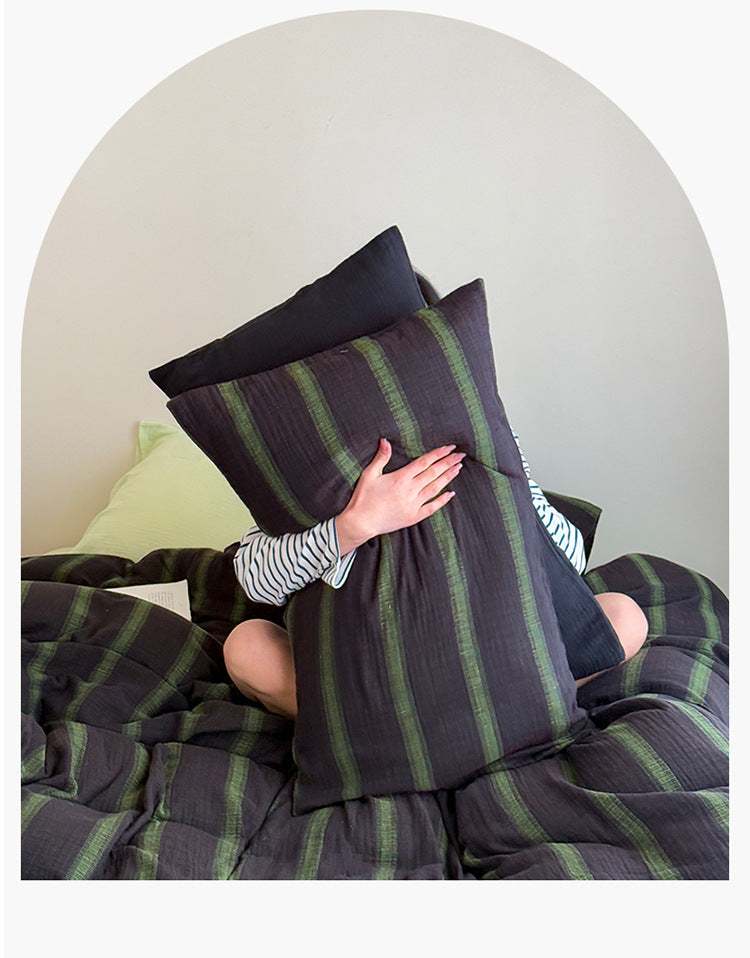 Striped Washed Cotton Gauze Bedding Set – Charcoal Lime Stripe, pillow held upright to show the stripe - Roomden