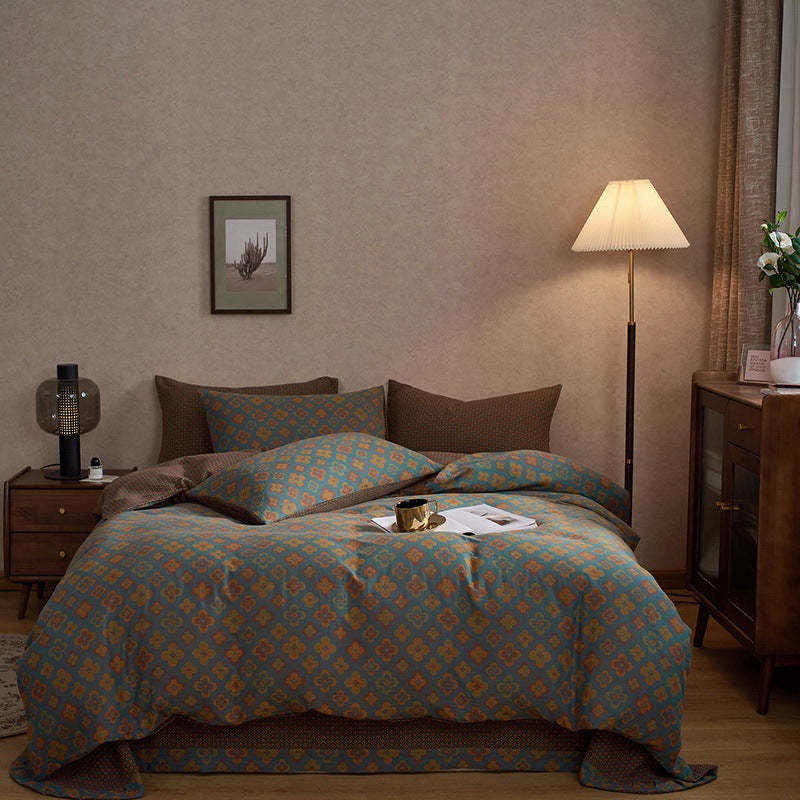 Rosewick Clover Trellis bedding set – mocha green, bedroom view of the duvet and pillows, view 1 - Roomden