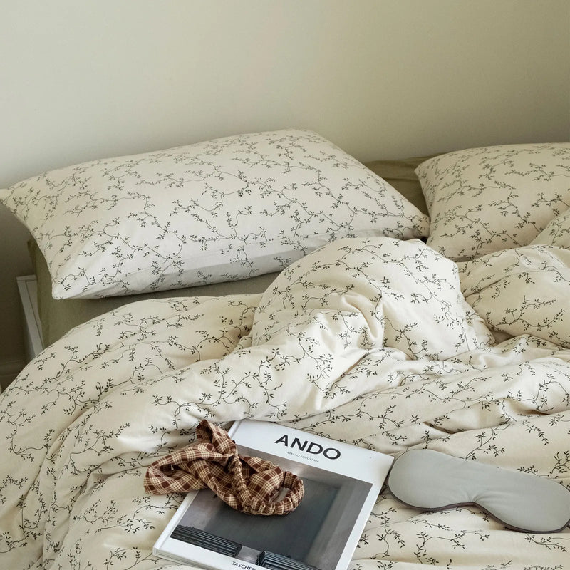 Full view of the Soft Dainty Vine Washed Cotton Bedding Set on a bed with duvet cover and two pillows — RoomDen