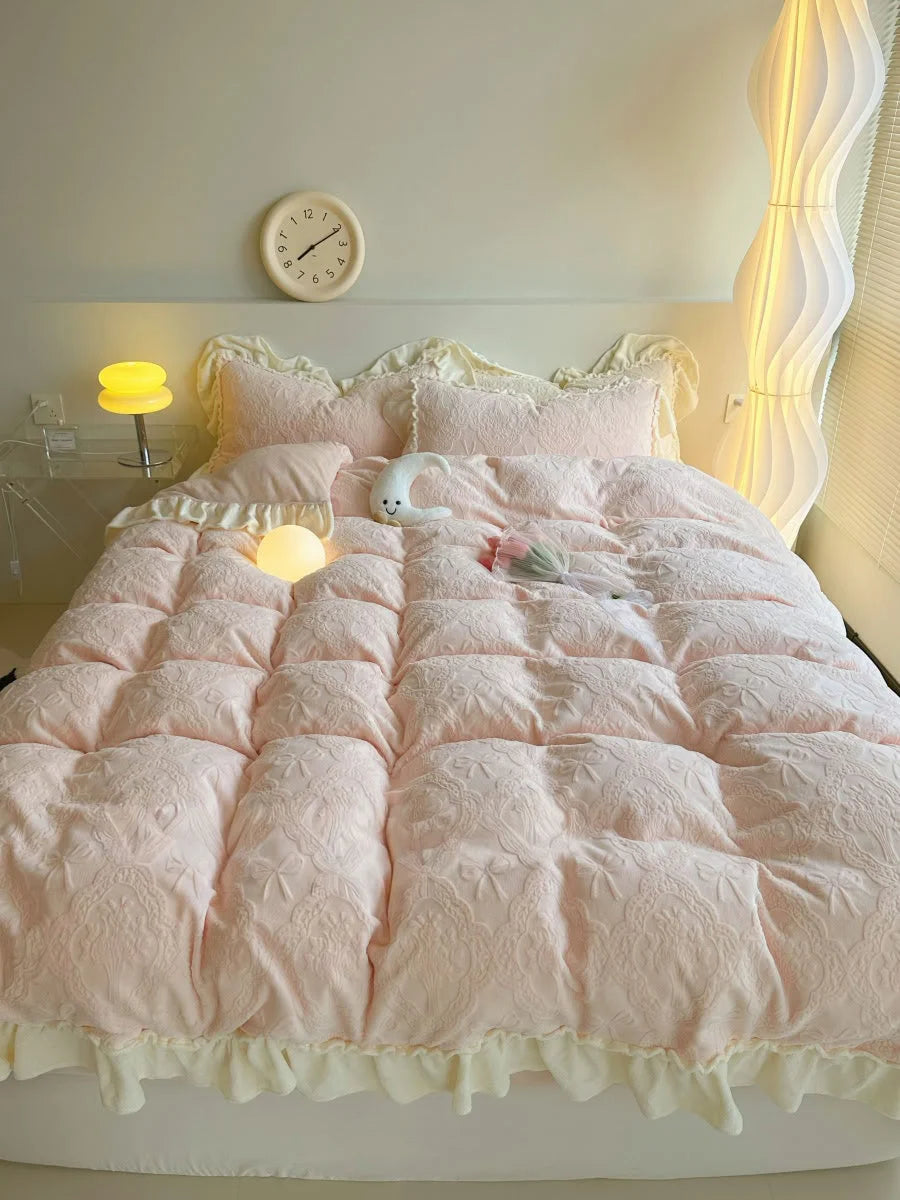 Full bed view of the Pastel Pink Embossed Bow Bedding Set, showcasing its soft and inviting look - RoomDen.