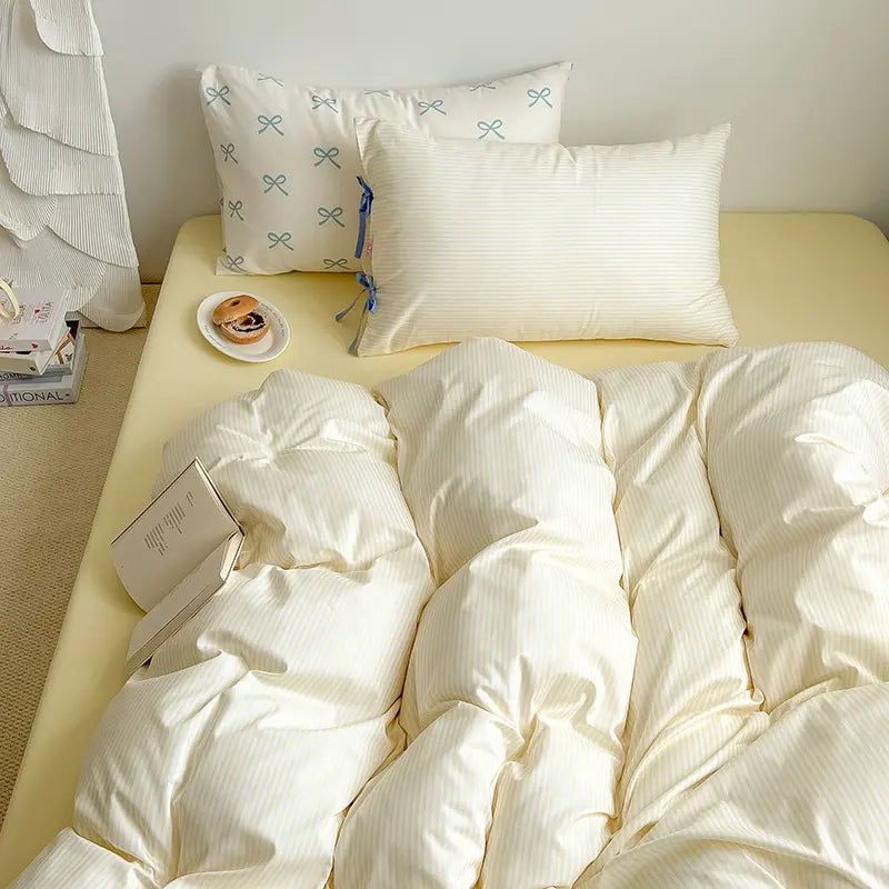 Bow striped cotton bedding set – Butter Yellow, coordinated duvet and pillow view - Roomden