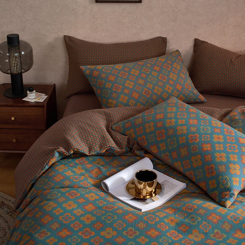 Rosewick Clover Trellis bedding set – mocha green, angled view of the duvet and coordinating pillows, view 3 - Roomden