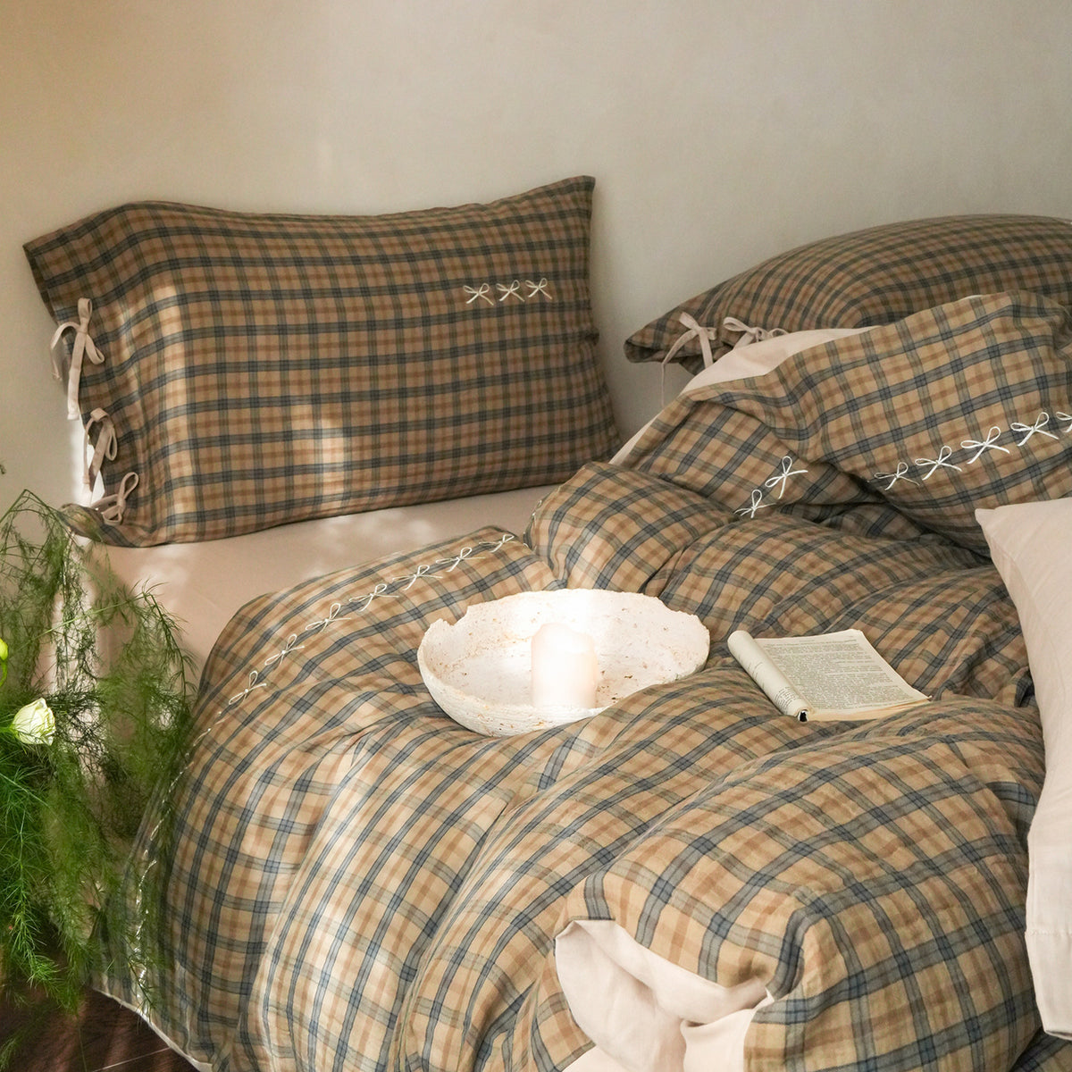 Brackenwood Checked Cotton Bedding Set – close view of sage checked duvet folds below matching pillows - Roomden