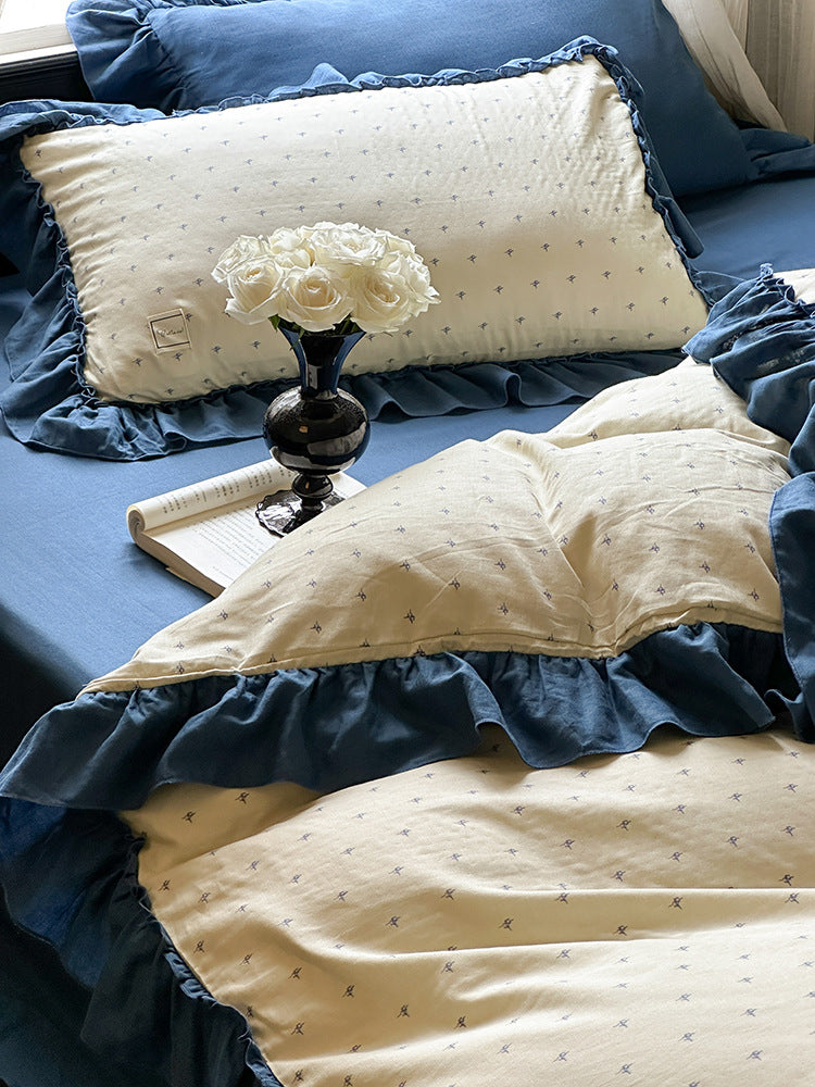 Fleurette Blue Star Sprig Double Gauze Bedding Set – Blue ruffles surrounding a small sprig pillow - Roomden
