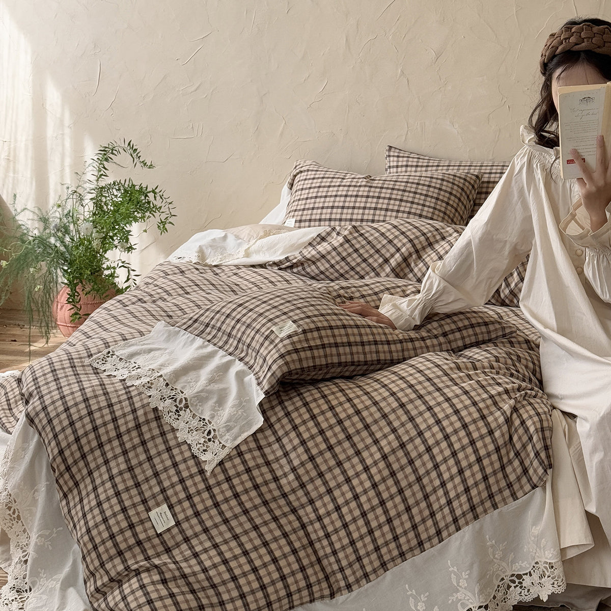 Checked Cotton Bedding Set with Bows and Lace – tea checked duvet with white lace border spread across the bed - Roomden