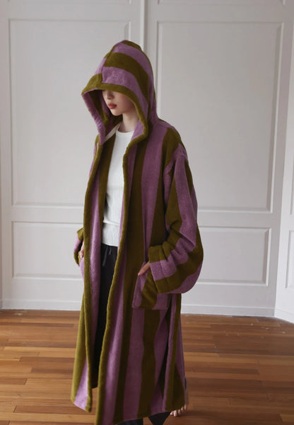 Side profile of the hooded robe showing the relaxed fit and length.