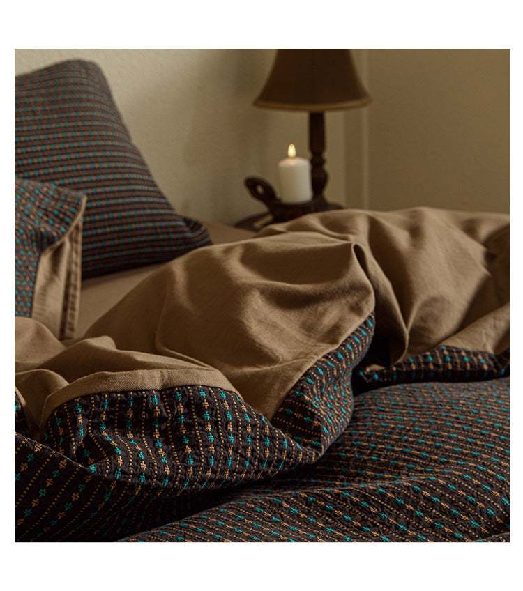 Amberlyn Walnut Micro Check cotton bedding set – angled view of the patterned cotton and plain companion fabric - Roomden