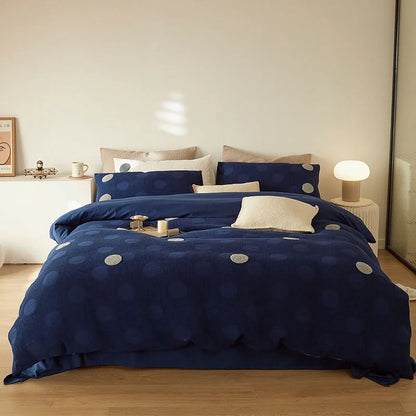Full view of the Navy Polka Dot Flannel Fleece Bedding Set styled on a modern bed in a minimalist room. - RoomDen