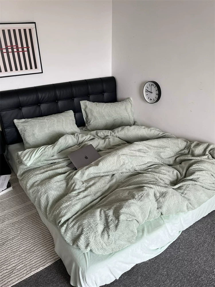 Wave textured plush bedding – sage green wide bedroom view with the duvet draped - Roomden