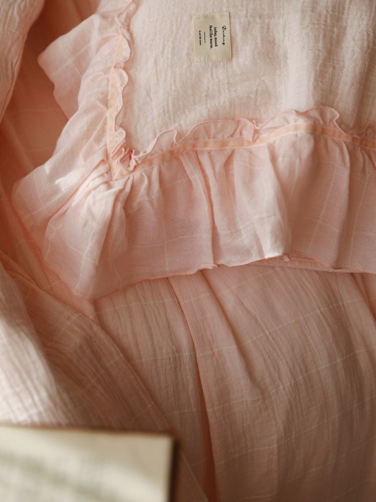 Soft Ruffle Cotton Double Gauze Bedding Set – close detail of the peach ruffle and gauze texture - Roomden