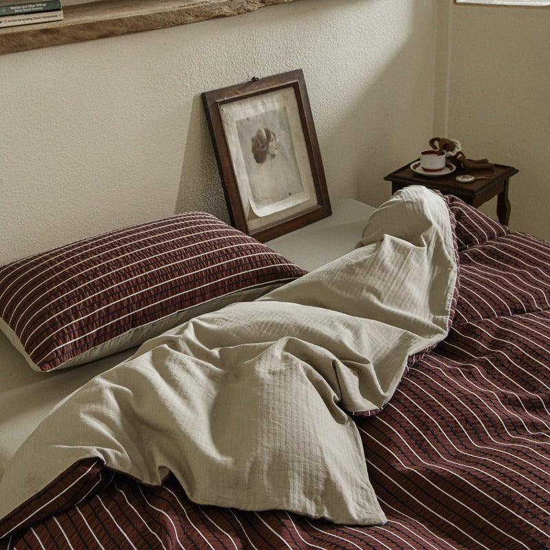 Amberlyn Burgundy Fine Stripe cotton bedding set – closer view of the coordinated pillows and duvet - Roomden