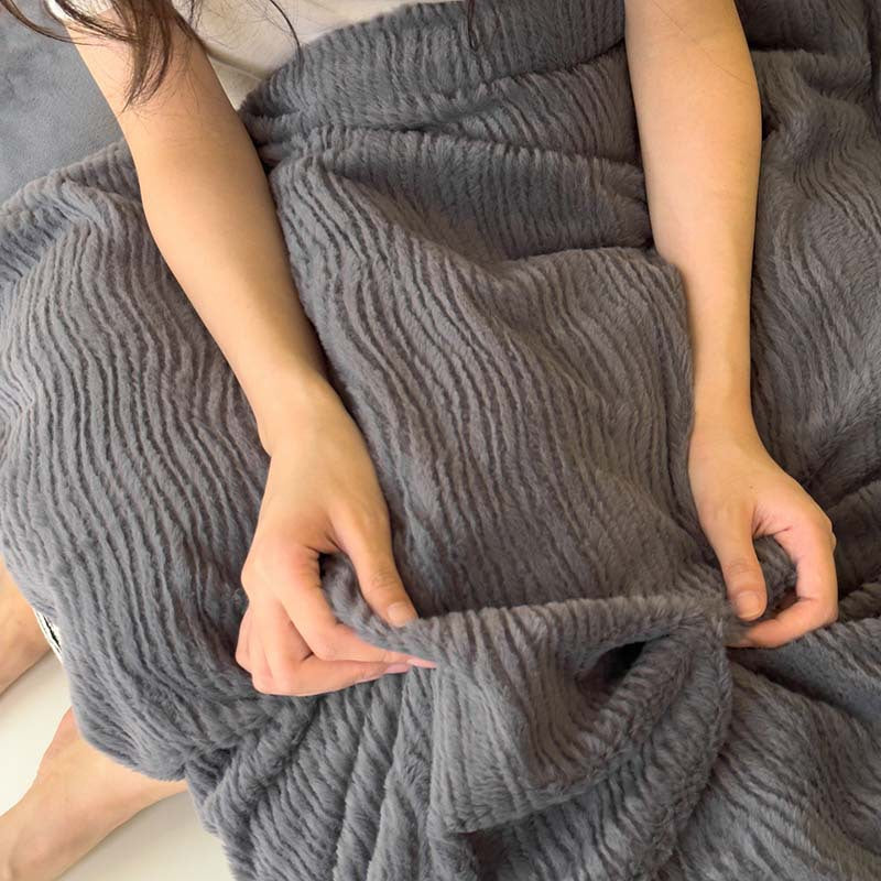 Wave textured plush bedding – charcoal grey close view of the raised wave pattern - Roomden