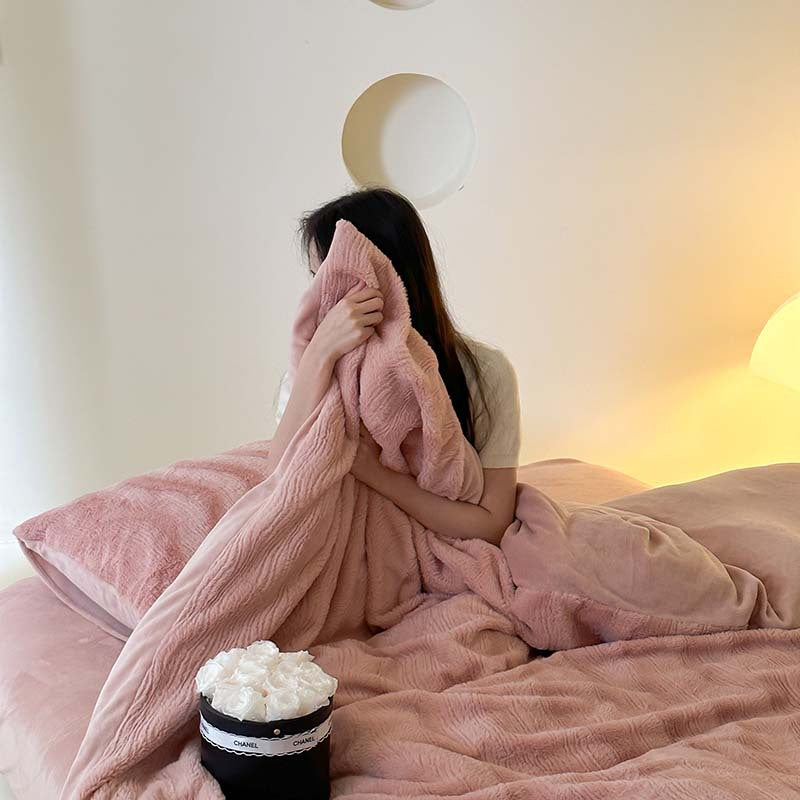 Wave textured plush bedding – blush pink model holding a matching pillow - Roomden
