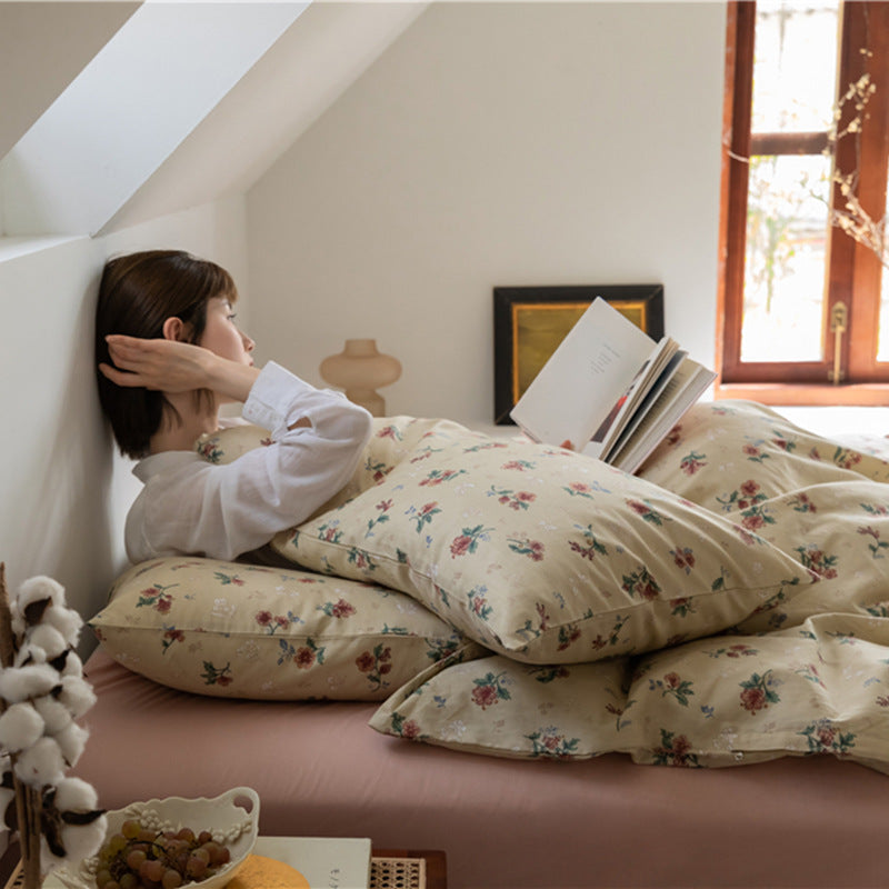 Buttercream Vintage Bouquet Cotton Bedding Set – reading scene beside the window with matching pillows - Roomden