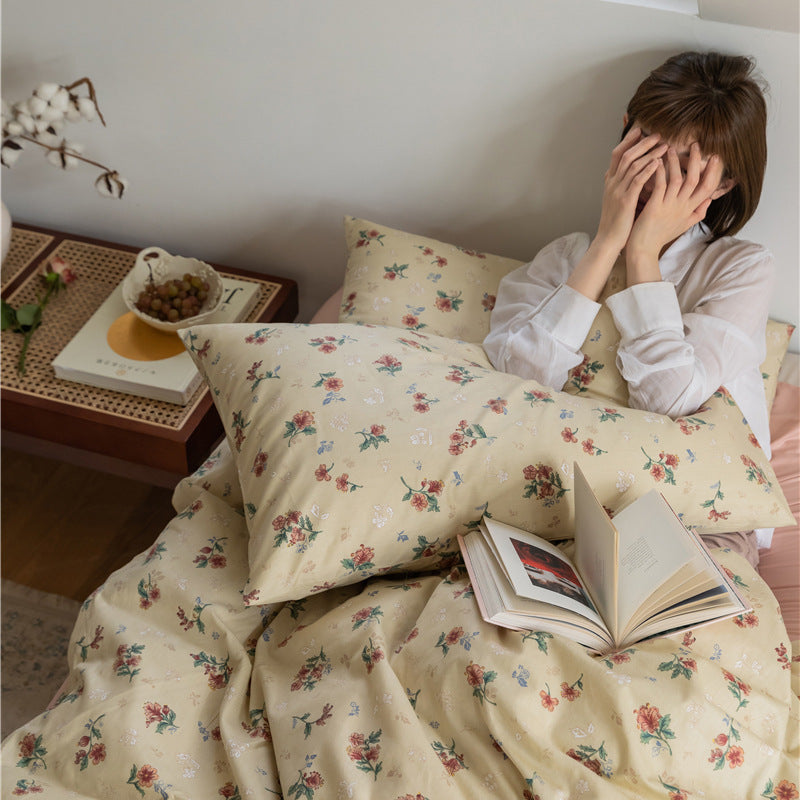Buttercream Vintage Bouquet Cotton Bedding Set – matching pillow and duvet in a quiet reading scene - Roomden