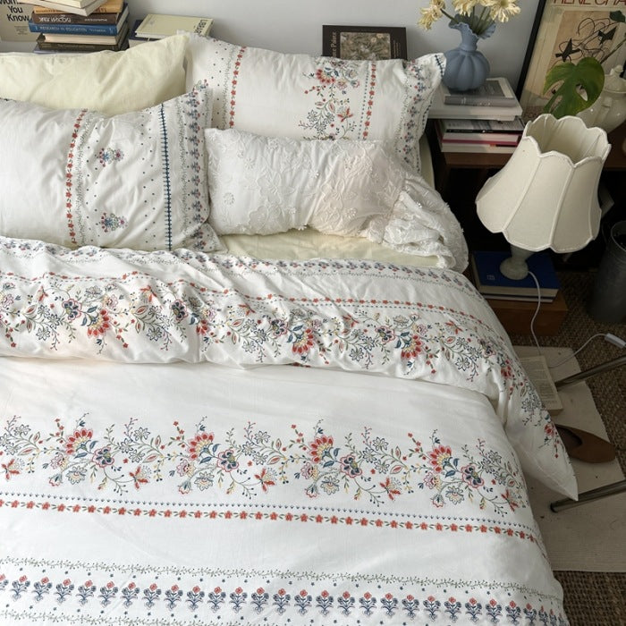 Ivory Floral Border Stripe Cotton Bedding Set – full bed scene showing the printed duvet and pillow arrangement - Roomden