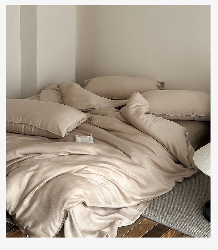 Sandwashed Lyocell Bedding Set – Autumn Taupe, relaxed bed arrangement showing the fabric drape - Roomden