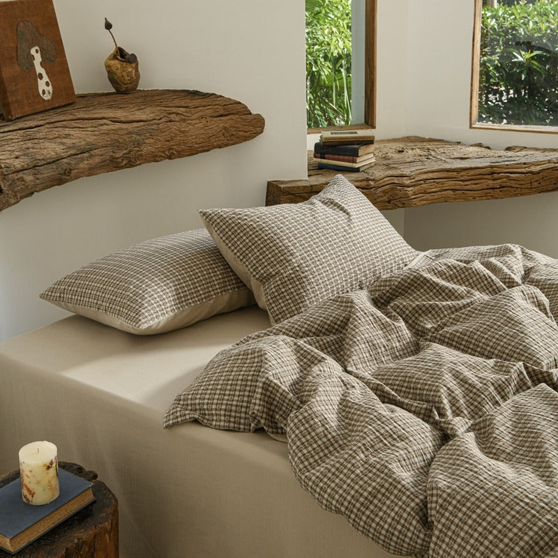 Amberlyn Taupe Mini Check cotton bedding set – angled view of the patterned cotton and plain companion fabric - Roomden