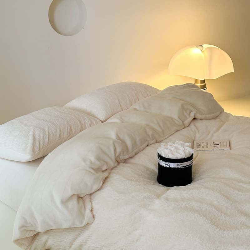 Wave textured plush bedding – creamy white side view with the smooth reverse turned back - Roomden