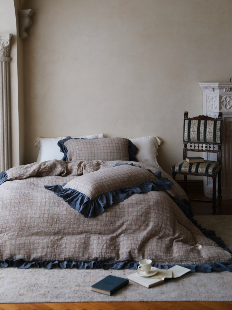 Contrast Ruffle Checked Cotton Gauze Bedding Set – full view of slate checked bedding with dark blue ruffles - Roomden