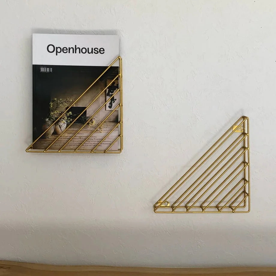 Lifestyle image of the wall-mounted magazine rack next to an empty one, showing its form - RoomDen