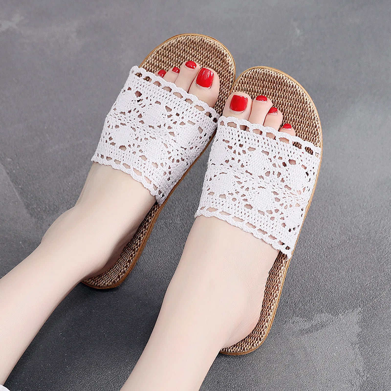 Close up detail of beige crochet lace upper on linen slipper - RoomDen