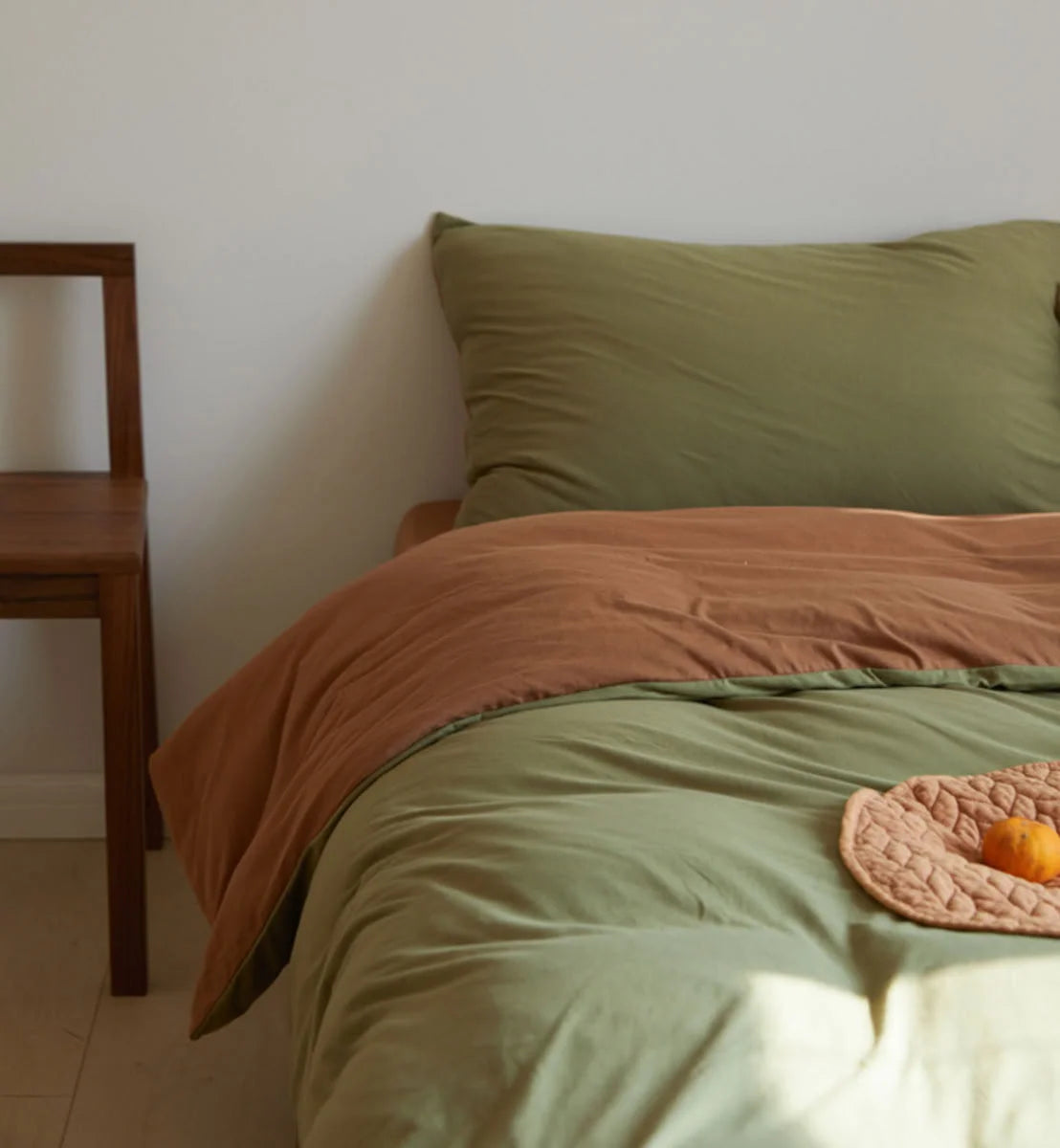 Close-up of Olive Green and Cinnamon Brown Reversible Duvet Cover Texture - RoomDen