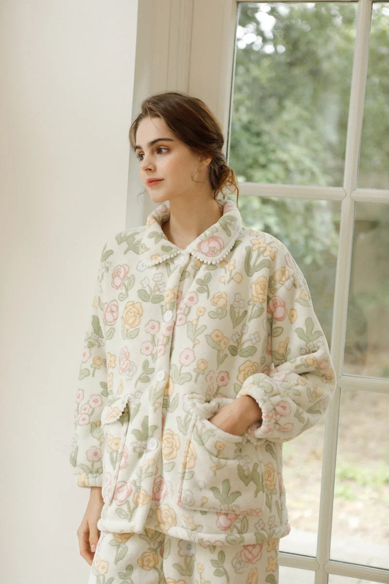 Model standing by window in warm winter floral sleepwear - RoomDen