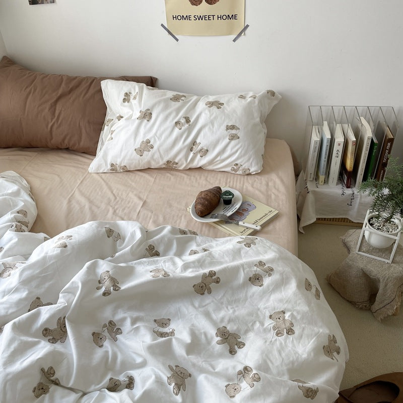 Ivory teddy bear cotton bedding with a beige sheet and brown pillow styling - Roomden