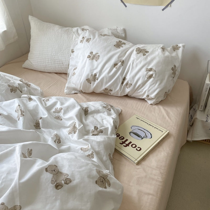 Ivory teddy bear pillowcase and duvet cover with neutral bedside styling - Roomden