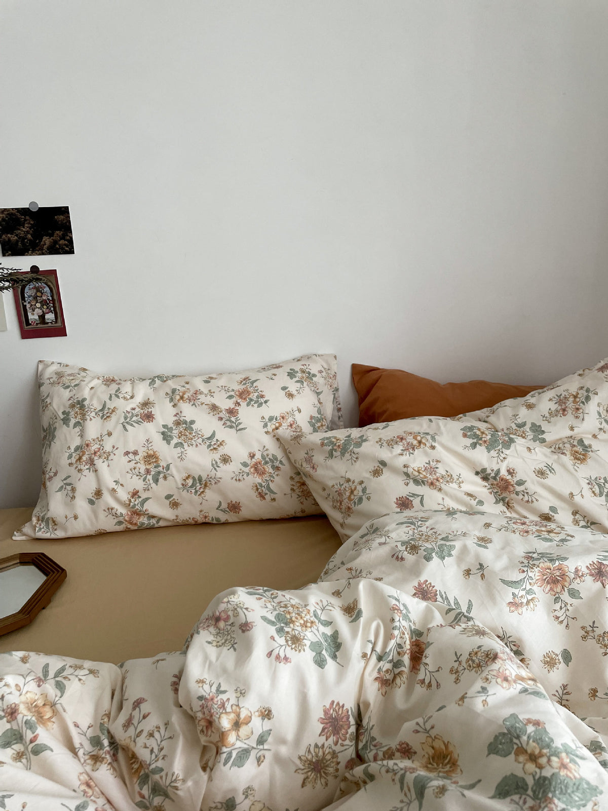 Florhaven Autumn Bouquet cotton bedding set – angled view of floral pillows and duvet - Roomden