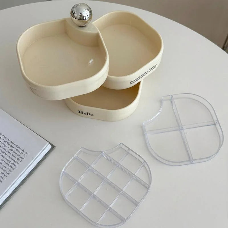 The creamy white jewelry organizer shown open with its removable compartment trays displayed. - RoomDen