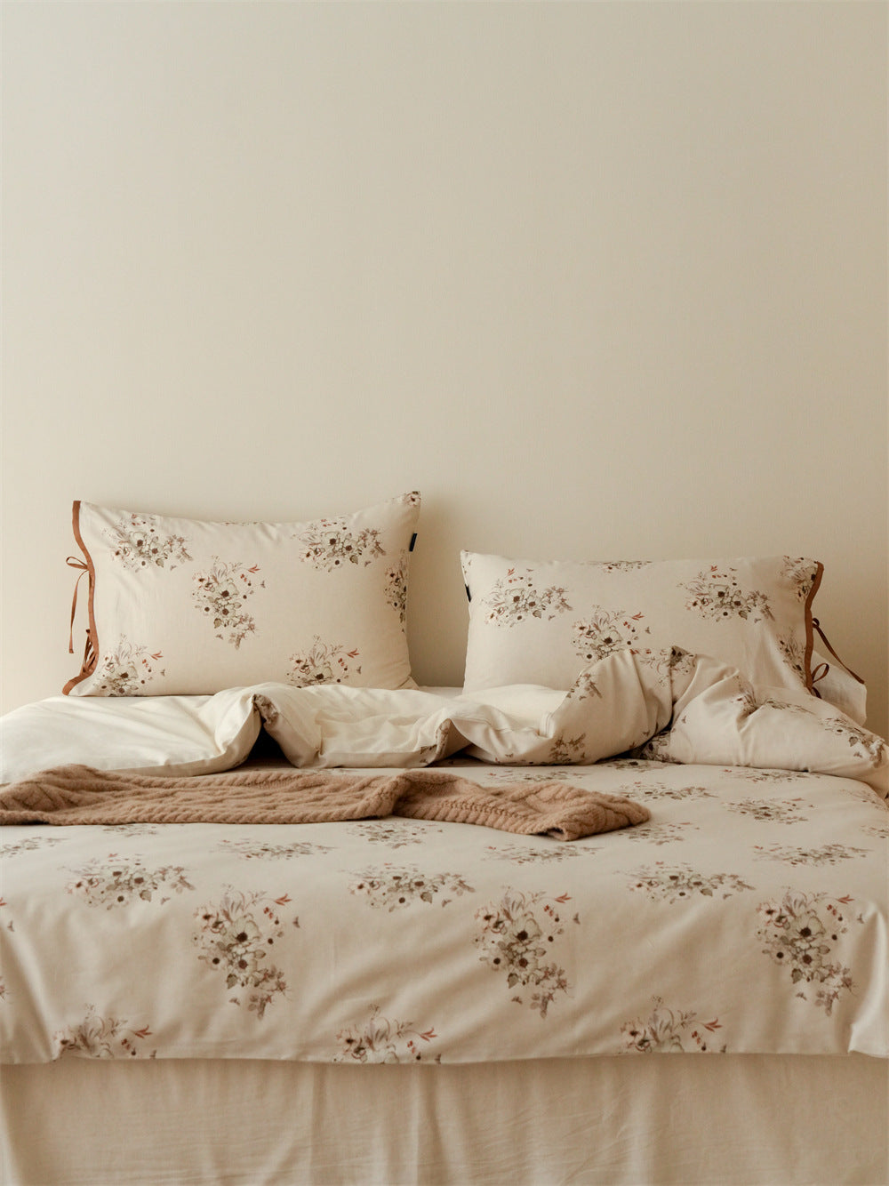 Stillgarden Butterfly Posy Cotton Linen Bedding Set – Front view of pale floral bedding and caramel ties - Roomden