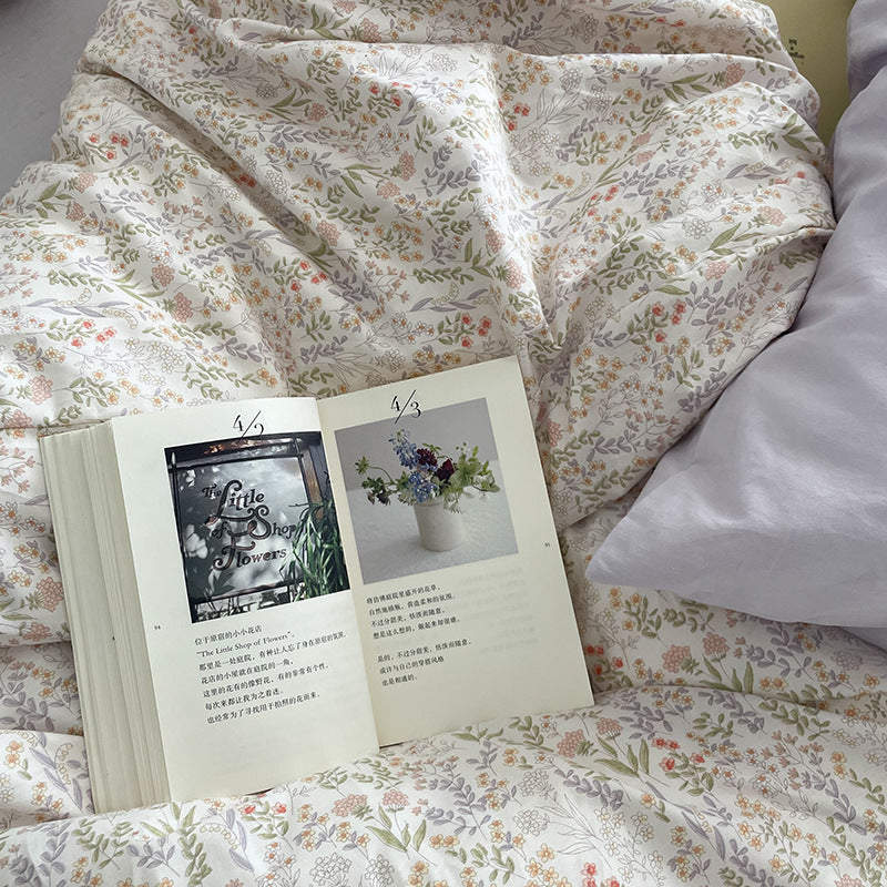 Ivory miniature meadow cotton bedding – close view of olive leaves and tiny peach flowers - Roomden
