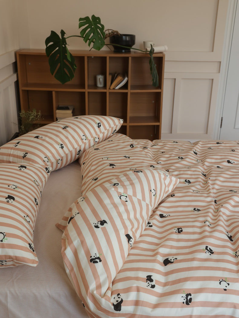 Peach Panda Stripe Cotton Bedding Set – overhead arrangement of matching striped pillows - Roomden